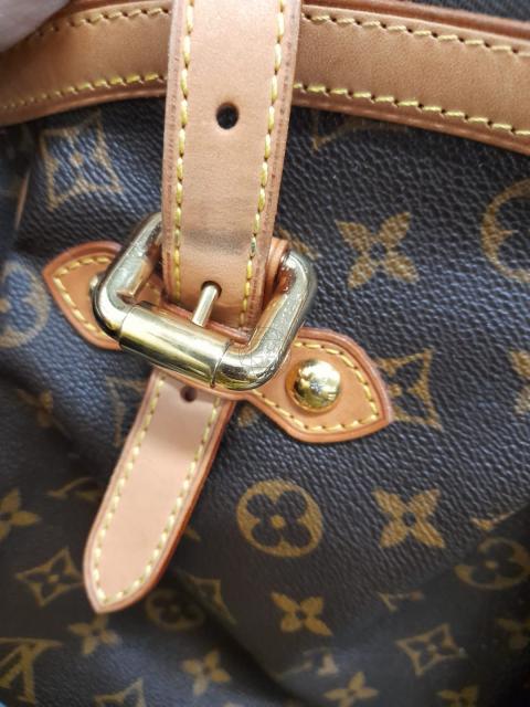 Louis Vuitton 2012 Monogram Tivoli Handbag · INTO