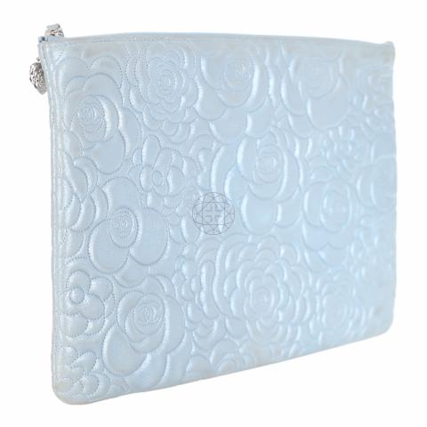 Naughtipidgins Nest - Chanel Mini O Case Zip Pouch in Camellia Embossed  Metallic Silver Calfskin A super useful, compact zipped card or coin pouch  crafted from a beautiful pewter toned, metallic calfskin