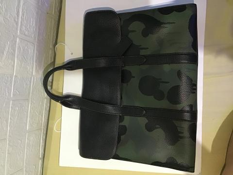 coach camo pouch