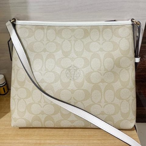 Coach file bag price hot sale