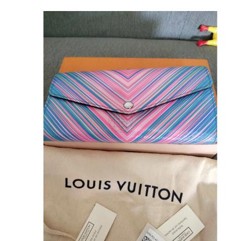 Preloved Louis Vuitton Lavender Epi Leather Sarah Wallet CA0091 020523 –  KimmieBBags LLC