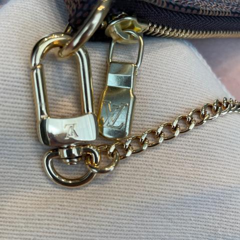 Louis Vuitton Brown Damier Ebene Mini Pochette Accessoires Cloth Metal  ref.172293 - Joli Closet