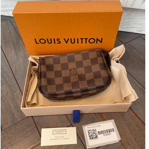 Louis Vuitton Brown Damier Ebene Coated Canvas Mini Pochette Accessoires  Gold Hardware, 2021 Available For Immediate Sale At Sotheby's