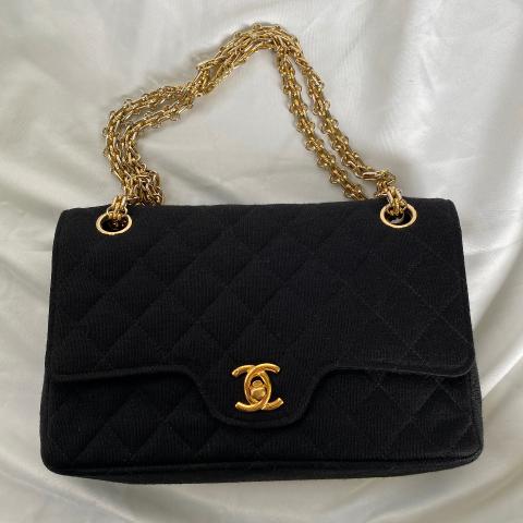Sold at Auction: CHANEL - 1980s Small Classic Black Quilted Leather Flap  Shoulder Bag / Crossbody