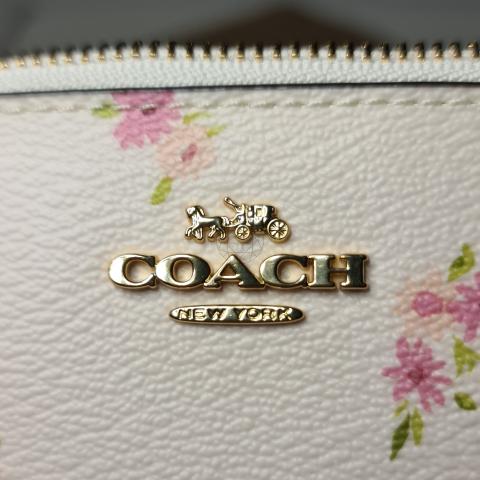 Sell Coach Corner Zip Wristlet - White | HuntStreet.com