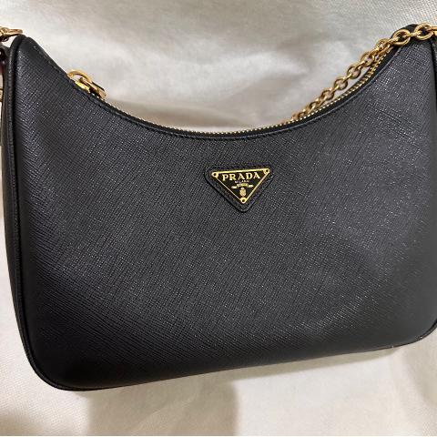 Prada re-edition 2005 saffiano leather bag in black or Louis Vuitton  Boulogne with black accents? : r/handbags