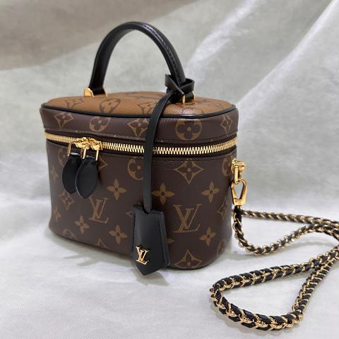 Vanity cloth handbag Louis Vuitton Brown in Cloth - 29812908