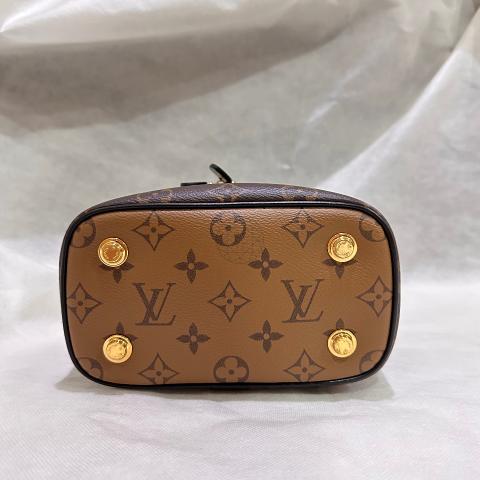 Vanity cloth handbag Louis Vuitton Brown in Cloth - 25273081