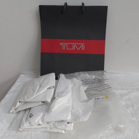 Tumi on sale paper bag