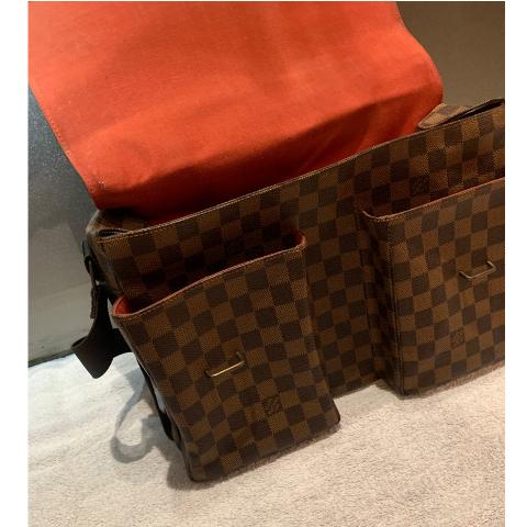 Louis Vuitton Damier Ebene Highbury, in brown and tobacco Louis Vuitton monogram  coated canvas, the brass zipper closure opening to sold at auction on  11th September