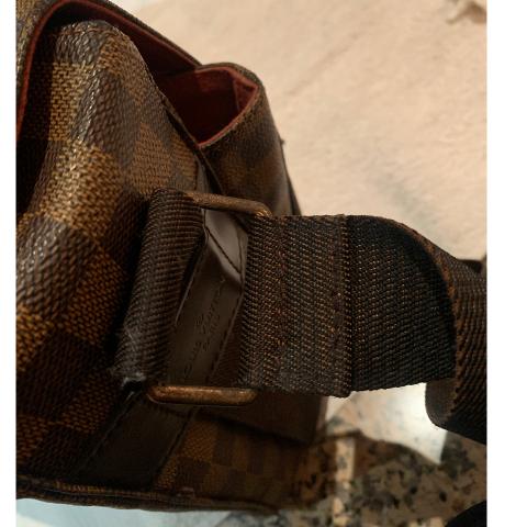 Louis Vuitton Damier Ebene Highbury, in brown and tobacco Louis Vuitton  monogram coated canvas, the brass zipper closure opening to sold at  auction on 11th September