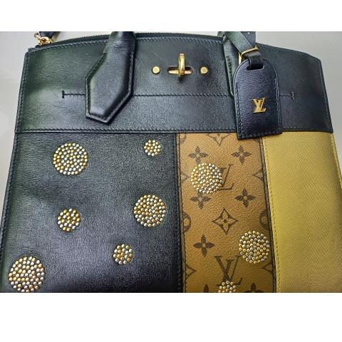 City Streamer PM python leather handbag by Louis Vuitton is our
