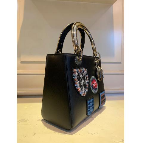 Christian Dior Diorific Bucket Bag Patch Embellished Leather Medium at  1stDibs