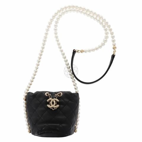 Chanel Mini Pearl Quilted Drawstring Bag and Platforms, Outside Khaite  FW2022 (New York)