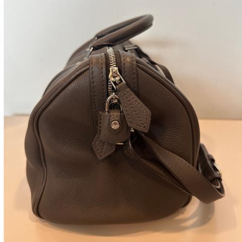 Sold at Auction: Louis Vuitton, LOUIS VUITTON Sofia Coppola model bag.  Skin. Suede interior. It has slight signs of use. In dark brown leather. It  has a flexible structure with a zipper