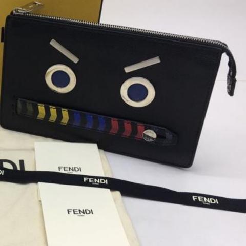 Sell Fendi Robot Faces Zip Clutch - Black | HuntStreet.com