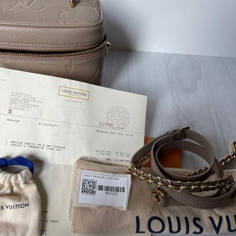 Vanity cloth handbag Louis Vuitton Brown in Cloth - 13610186