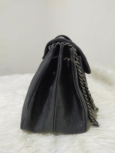 Saint Laurent Sade Shearling Shoulder Bag in Natural