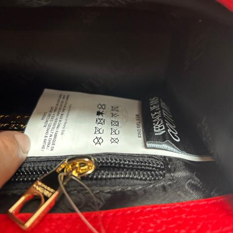 Versace hot sale bag fake