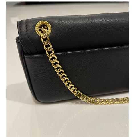Louis Vuitton LockMe Chain Bag East West worn by Shereé Whitfield as seen  in The Real Housewives of Atlanta (S15E05)