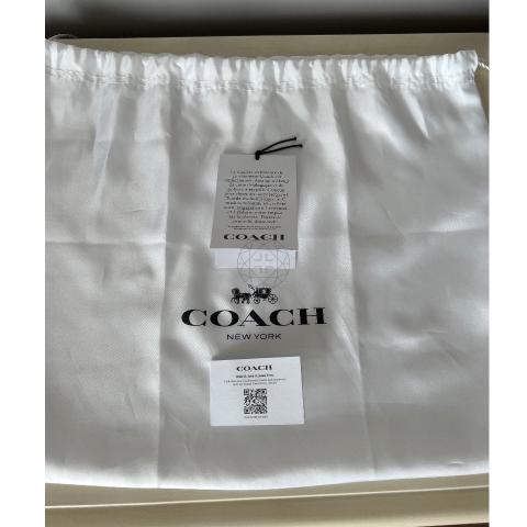 Coach white dust hot sale bag is it authentic