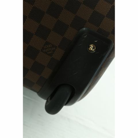 Louis Vuitton Pegase 50 Suitcase, in a brown Damier Ebene coated canvas,  with brown leather accents and golden brass hardware, opening to a black  nylo sold at auction on 3rd December