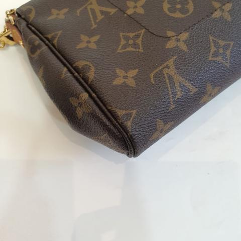 Favorite cloth handbag Louis Vuitton Brown in Cloth - 24567676