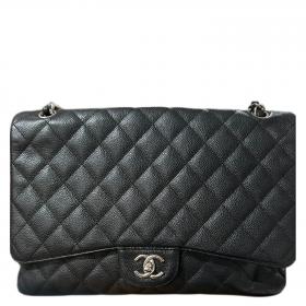 Coat: Max Mara Blouse: Theory Belt: Hermès Handbag: Chanel