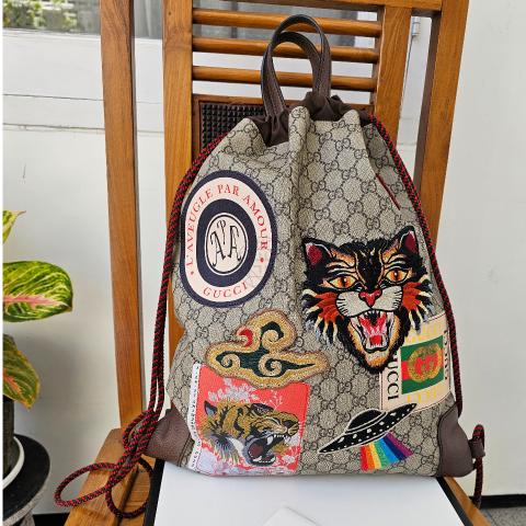 Gucci gg supreme drawstring backpack hotsell